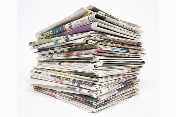 BGFY10 Stack of newspapers on a white background